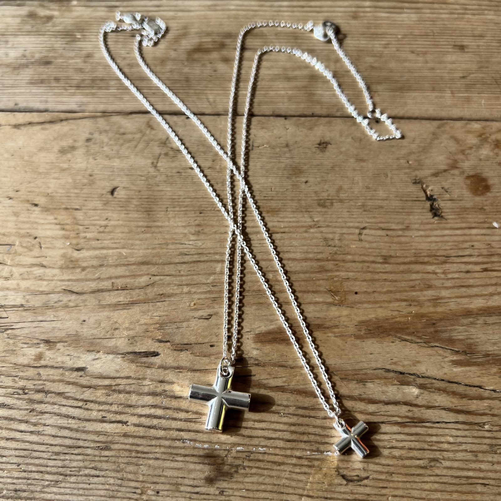 END cross head necklace